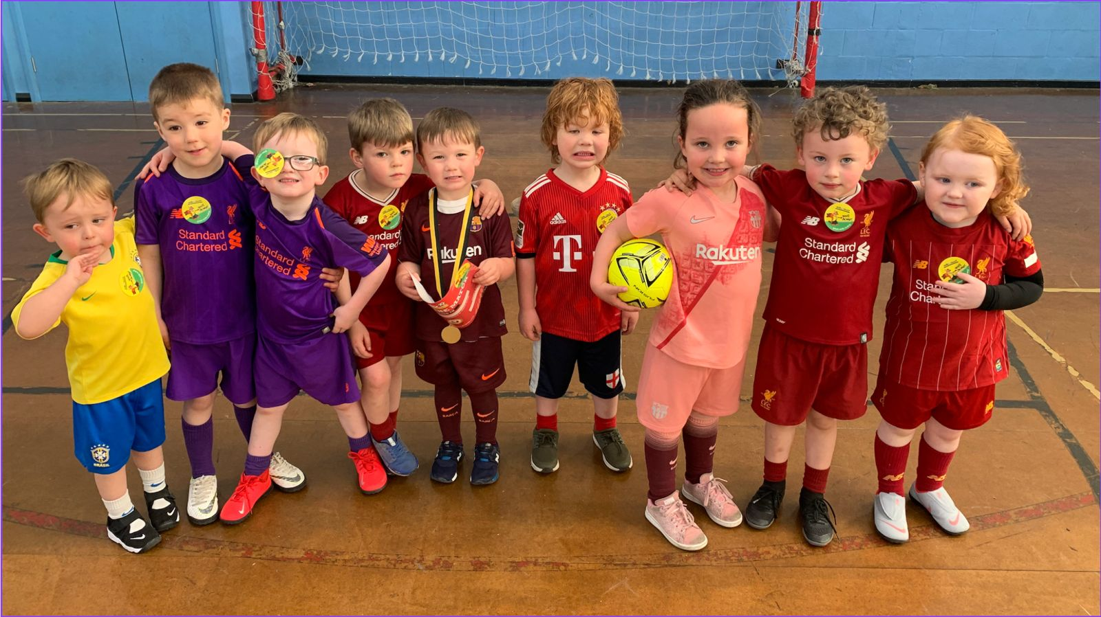 Young football players together at a Litherland Athletic JFC session